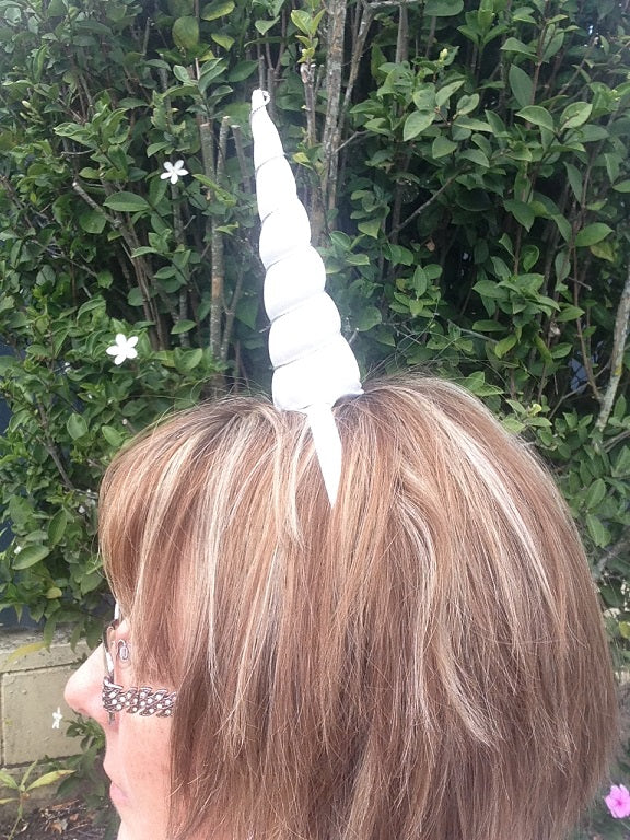 Attach a unicorn horn to a headband