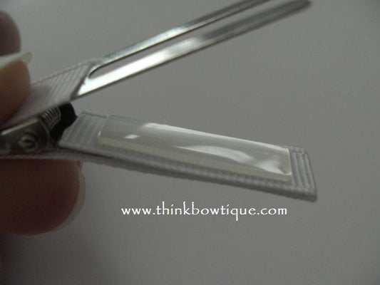 How to attach at triple flip grip to a hair clip