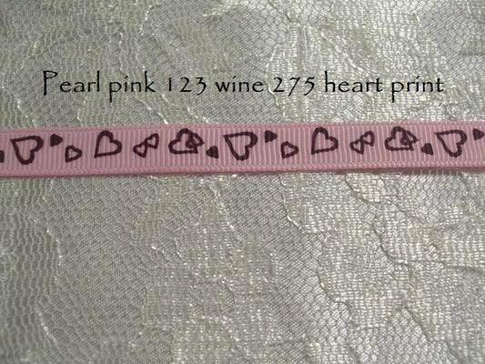 9mm Hearts 275 on pearl pink printed grosgrain ribbon 5 metres